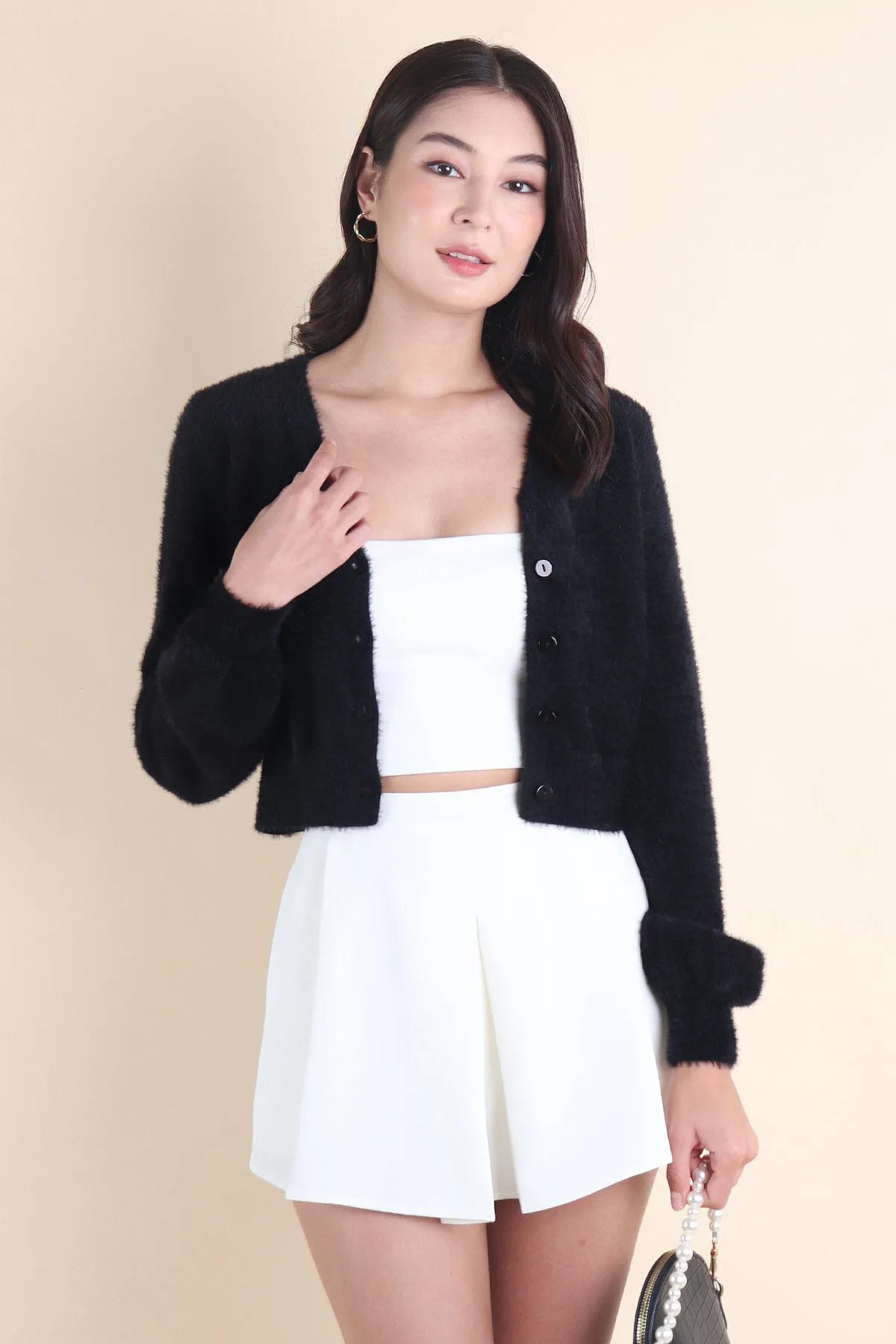 ELIZ BOW FURRY CARDIGAN IN BLACK